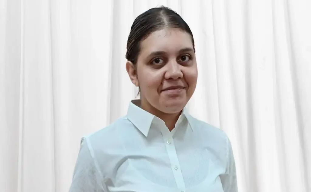 Her Futures Return to Work Tashanah - picture of Tashanah in a white shirt